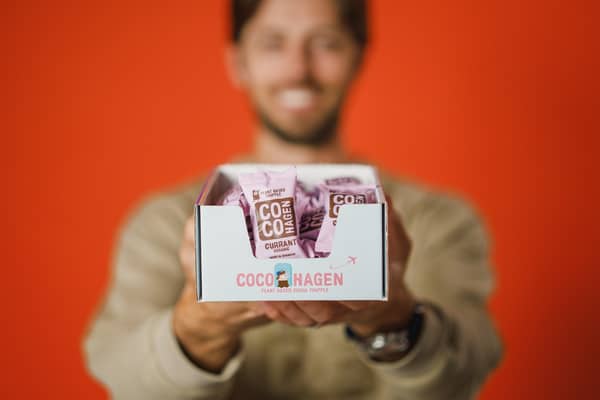 Cocohagen Packaging in front of a blurred man