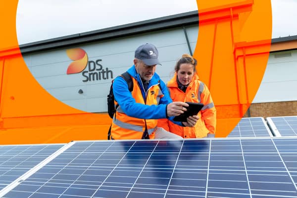 DS Smith employees at work in a photovoltaic installation.