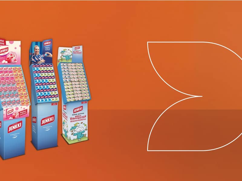 Jenkki chewing gum display stands, part of Cloetta's confectionery portfolio, against an orange background
