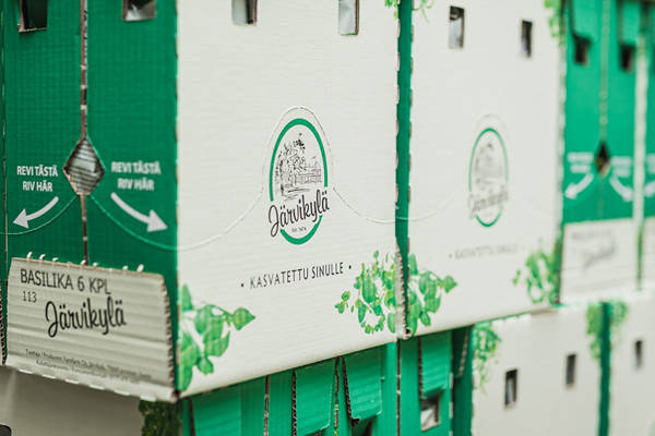 aaltopahvisia Järvikylä-brändin laatikoita kuvassa