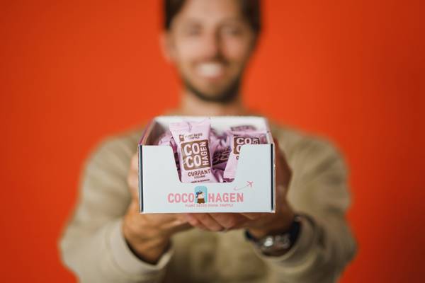 Cocohagen Packaging in front of a blurred man