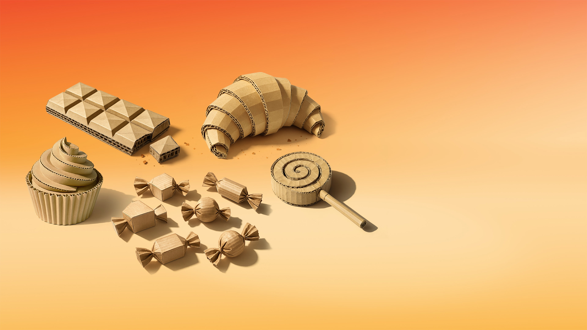 orange baggrund med snacks lavet i bølgepap